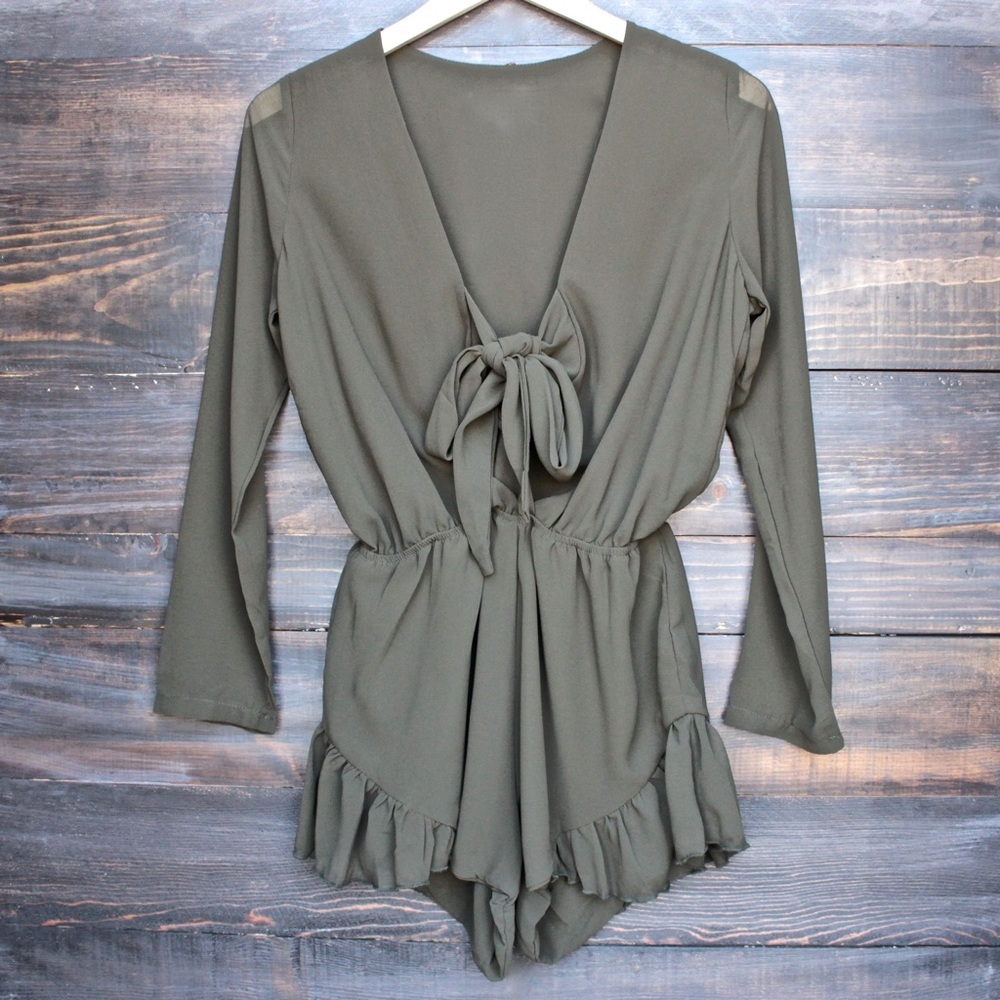 Beautiful olive romper but did not fit.